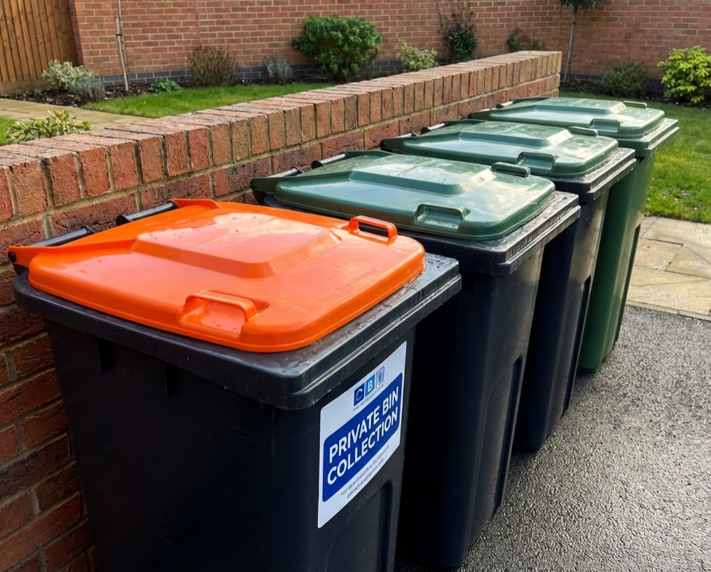 Recycling and general waste bins on a Worthing street
